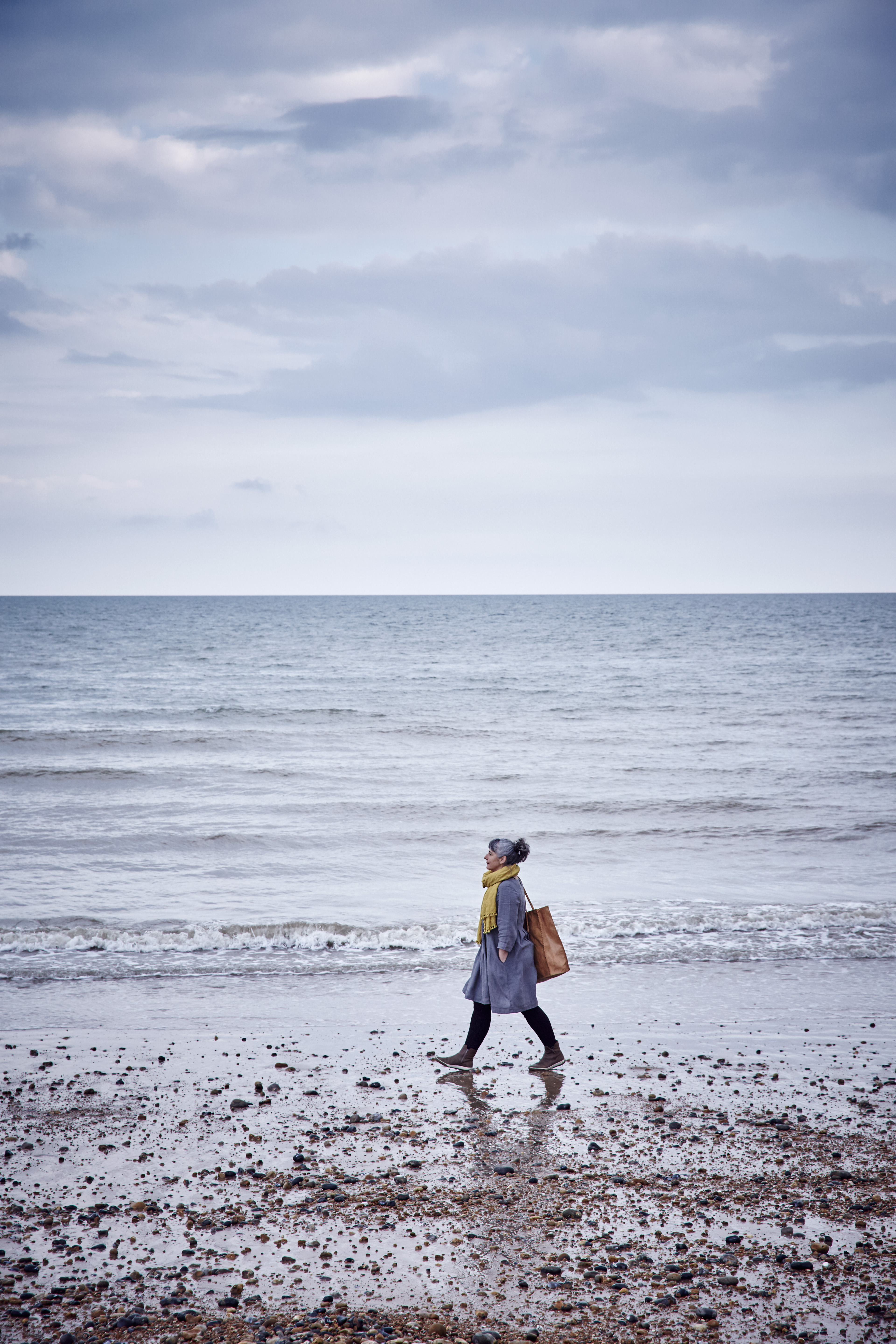 Pip walks along the sea shore