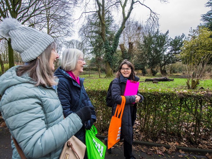 amy talks to two older women on the walk