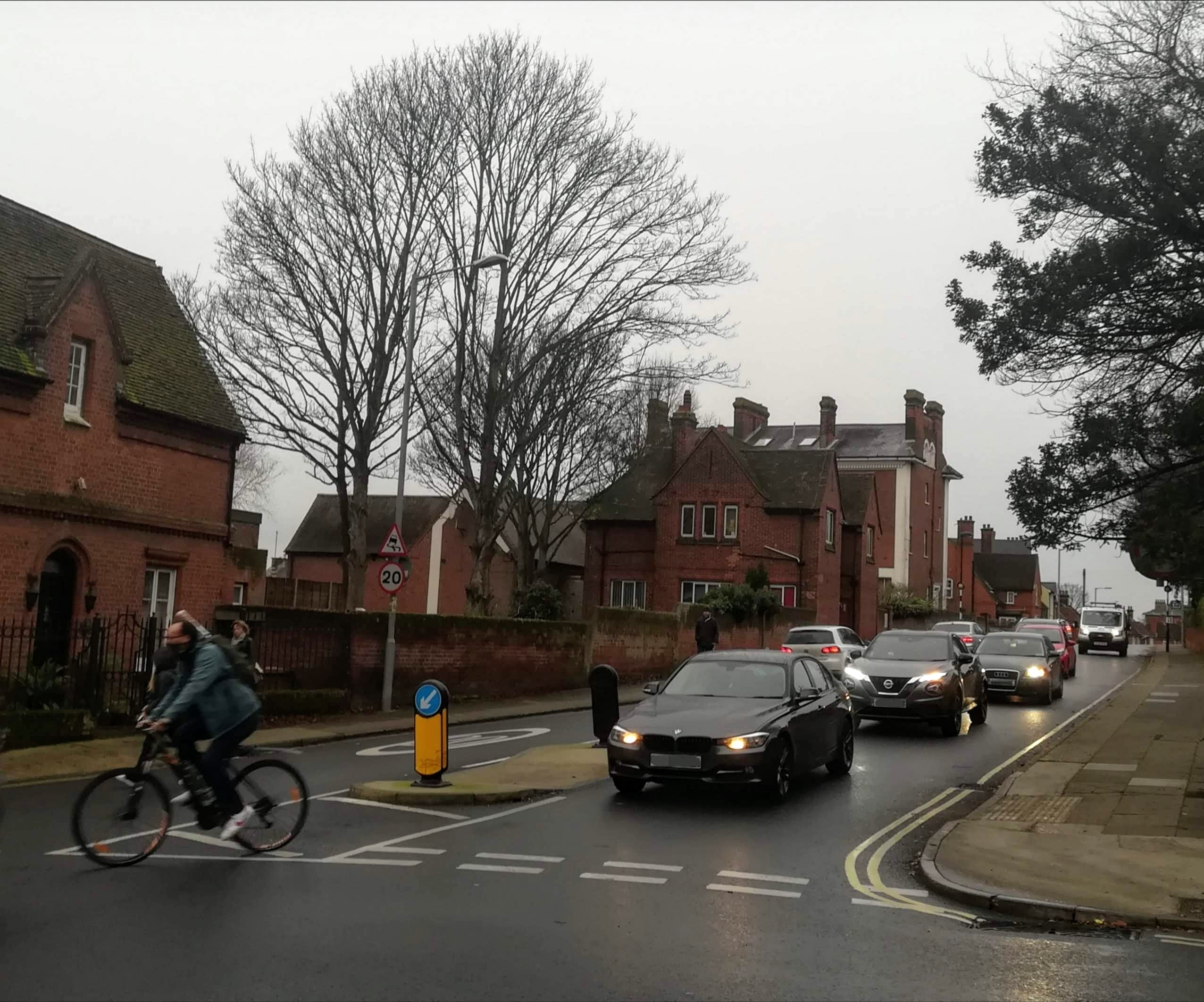 Cars and a cyclist on a road in Ipswich