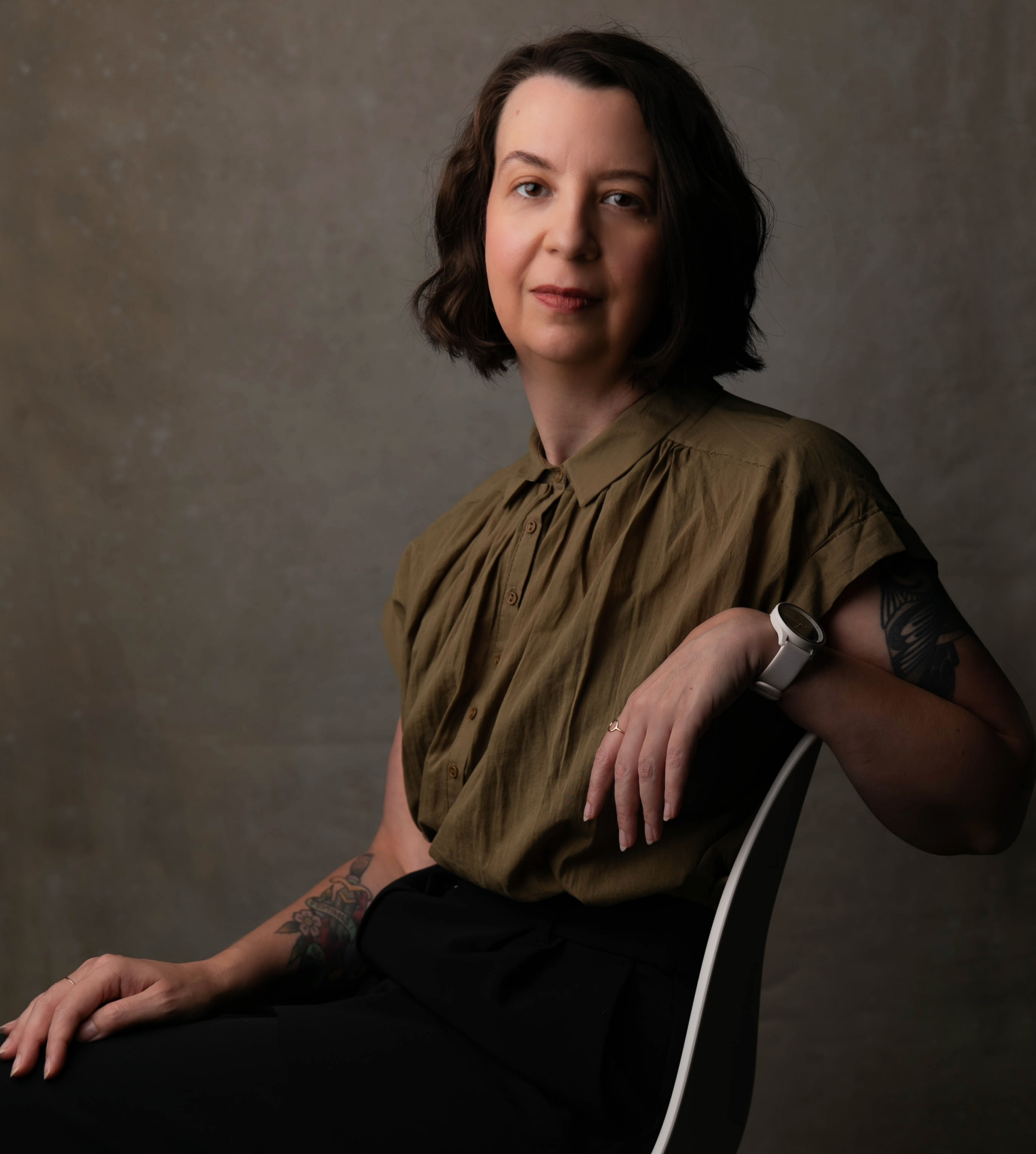 am image of a woman with mid-length, dark brown hair