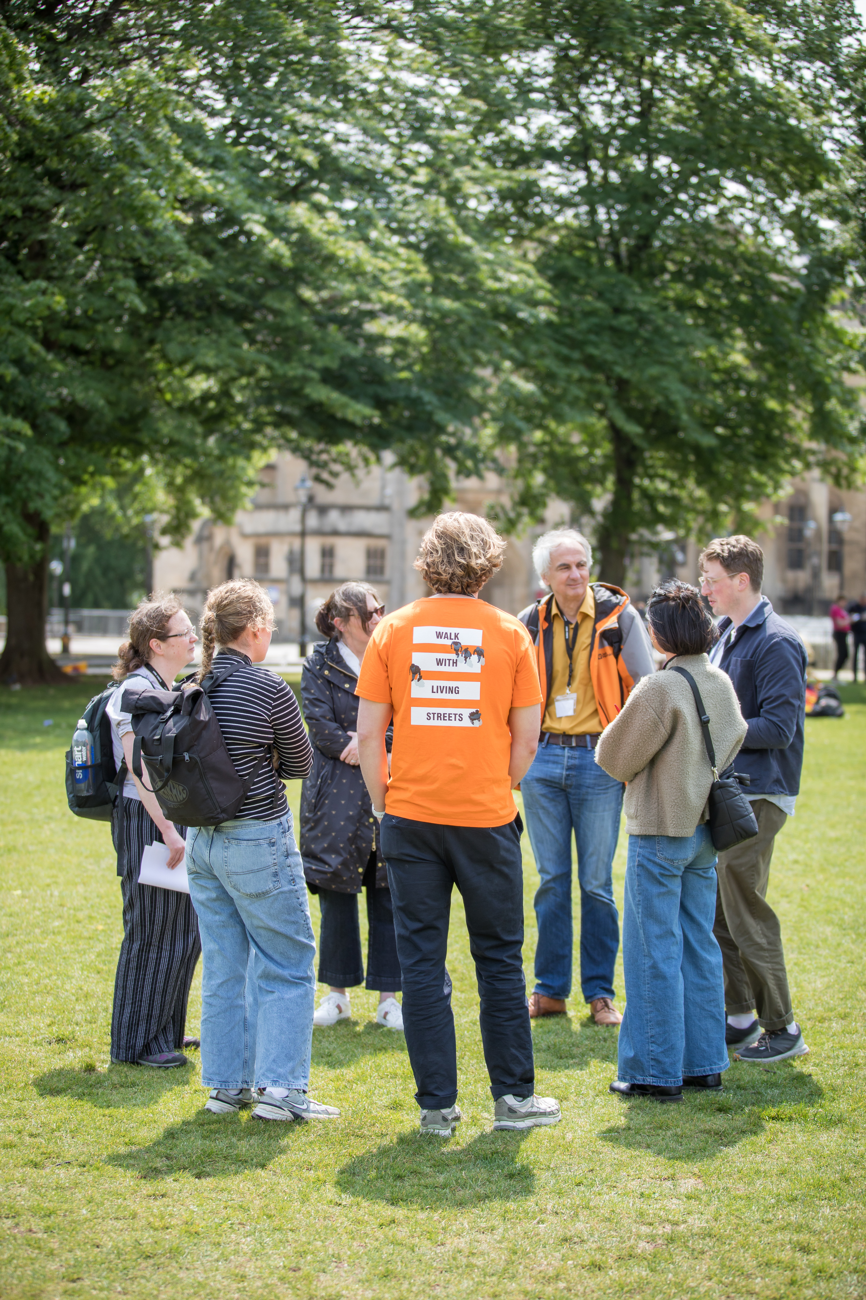 Walkshop attendees are stood on College Green discussing School Streets and the Walk to School