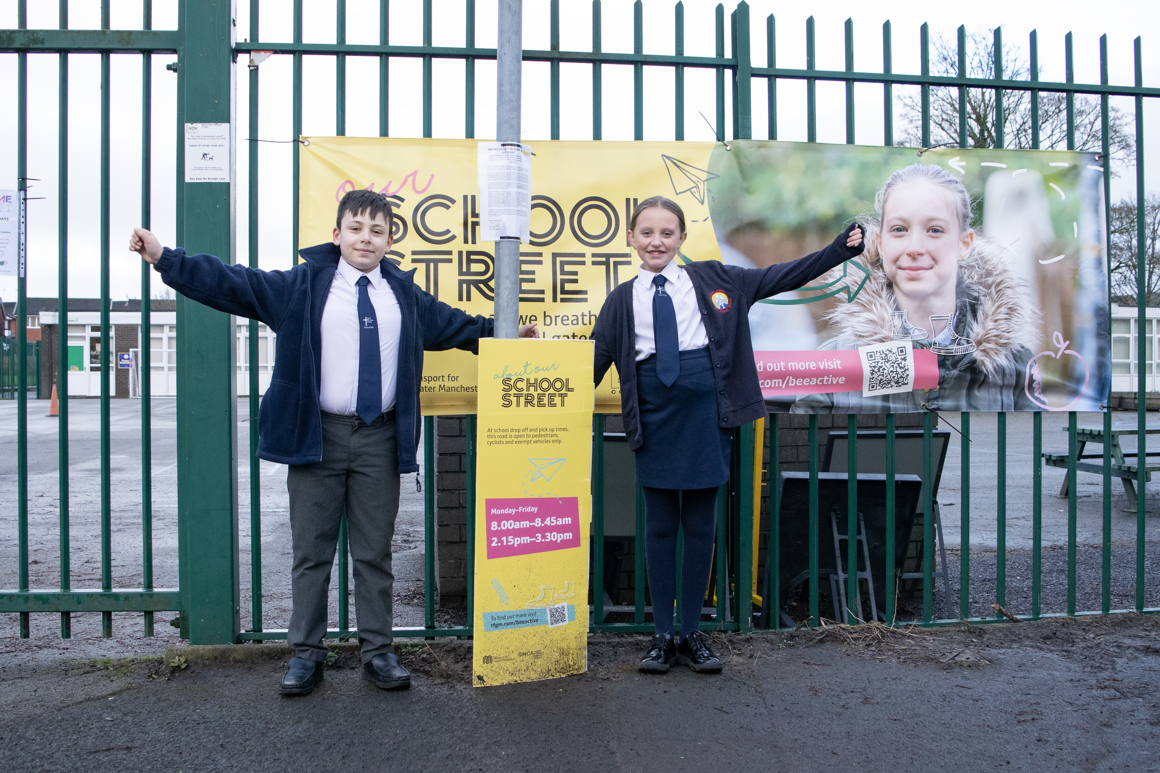 Two children outside a School Street