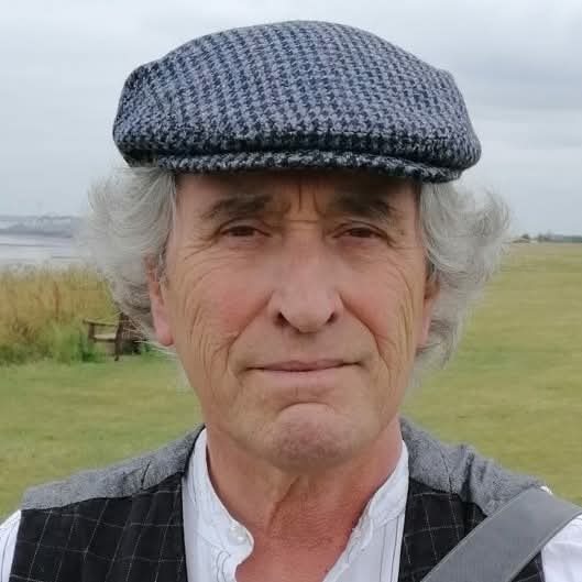 Martin, standing in a field