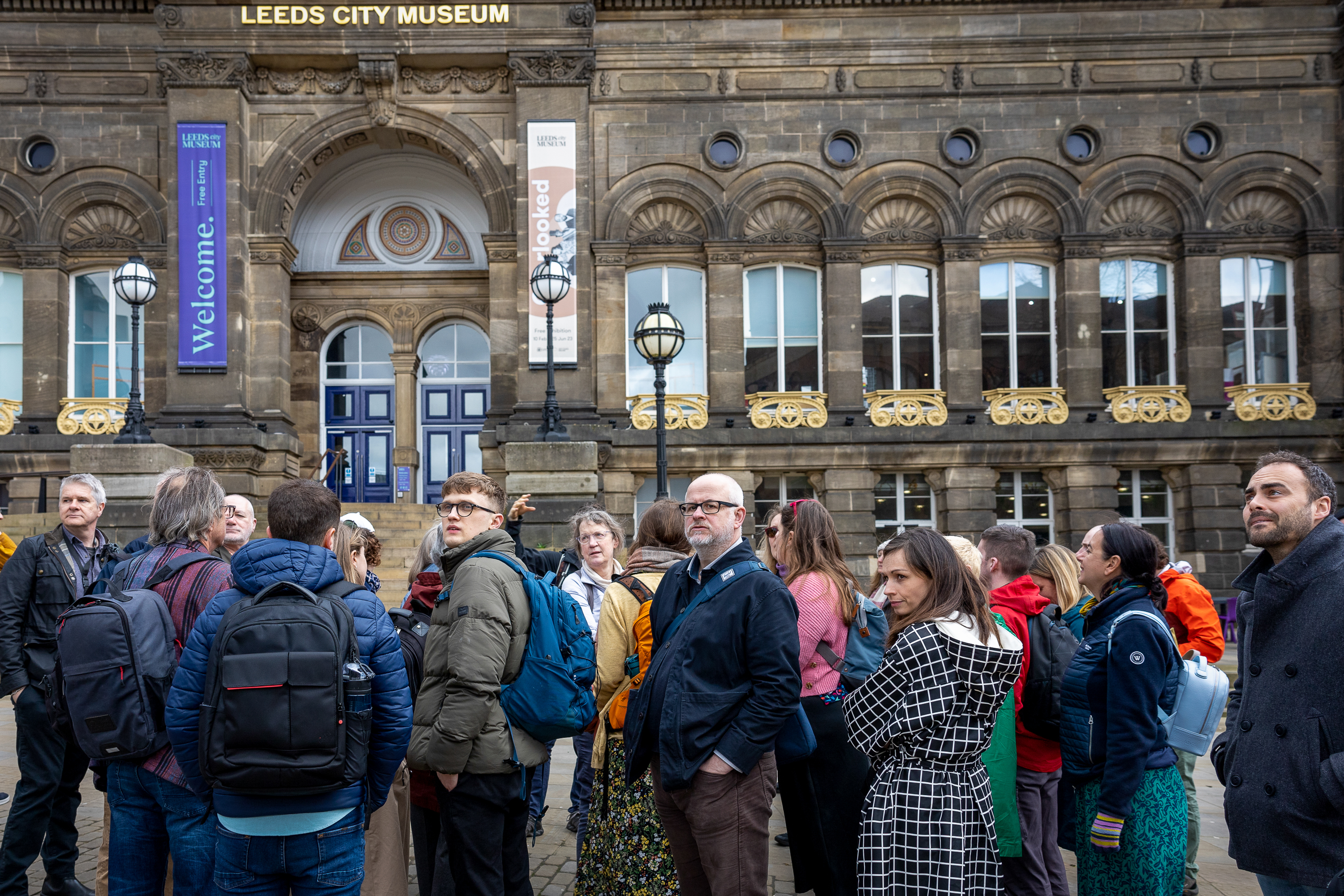People standing out Leeds City Museum