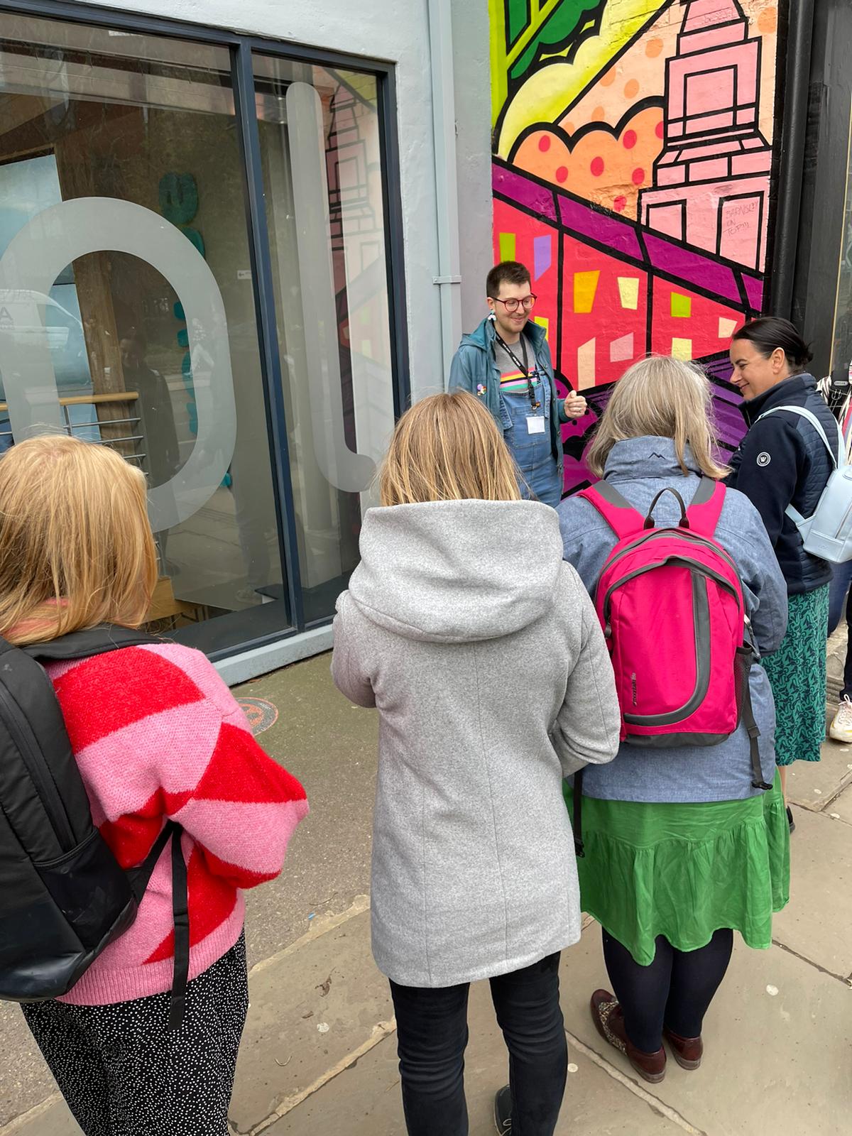 A group of people on a hidden histories walk in Leeds