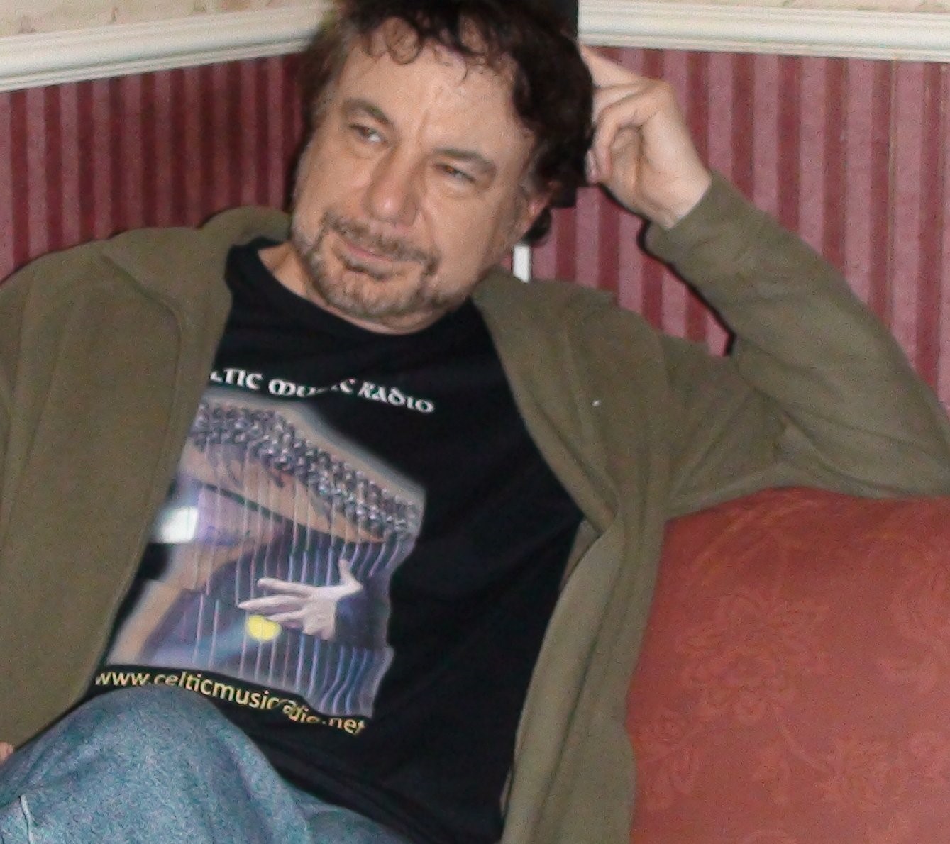 Johnny sitting on a sofa