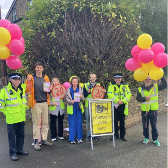 Living Streets Shipley Saltaire sharing the ideas in the report at drop off and pick up times on Grosvenor Road. Credit: Street Space