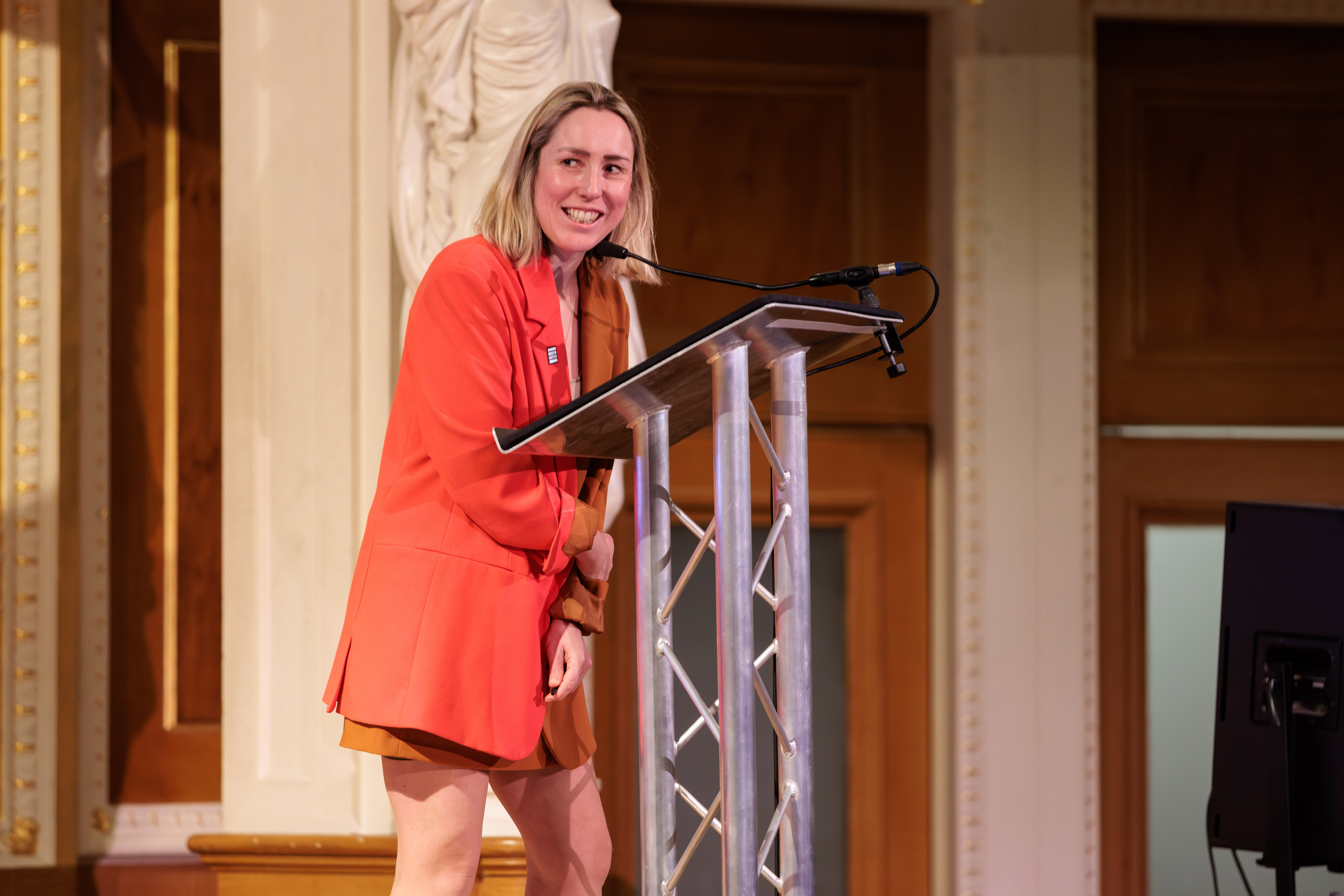 Kirsty McCaskill-Baxter on stage at the summit