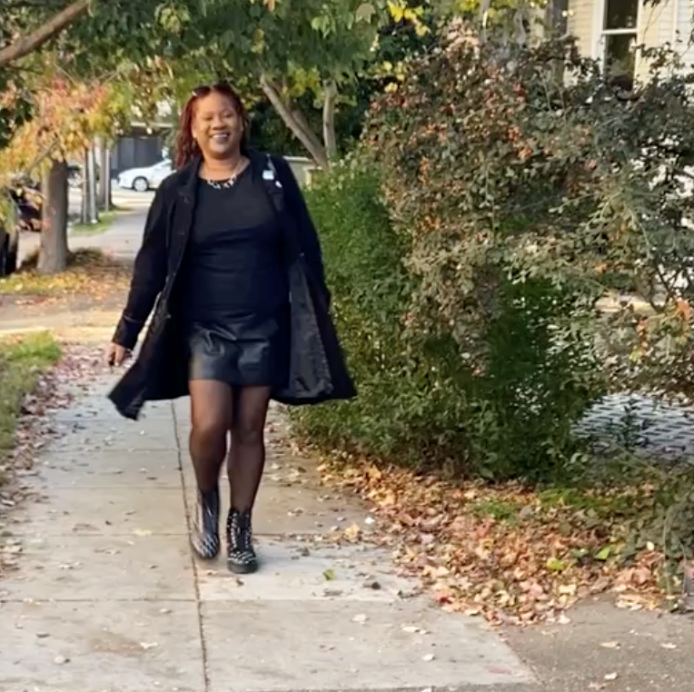 a woman walking down the street