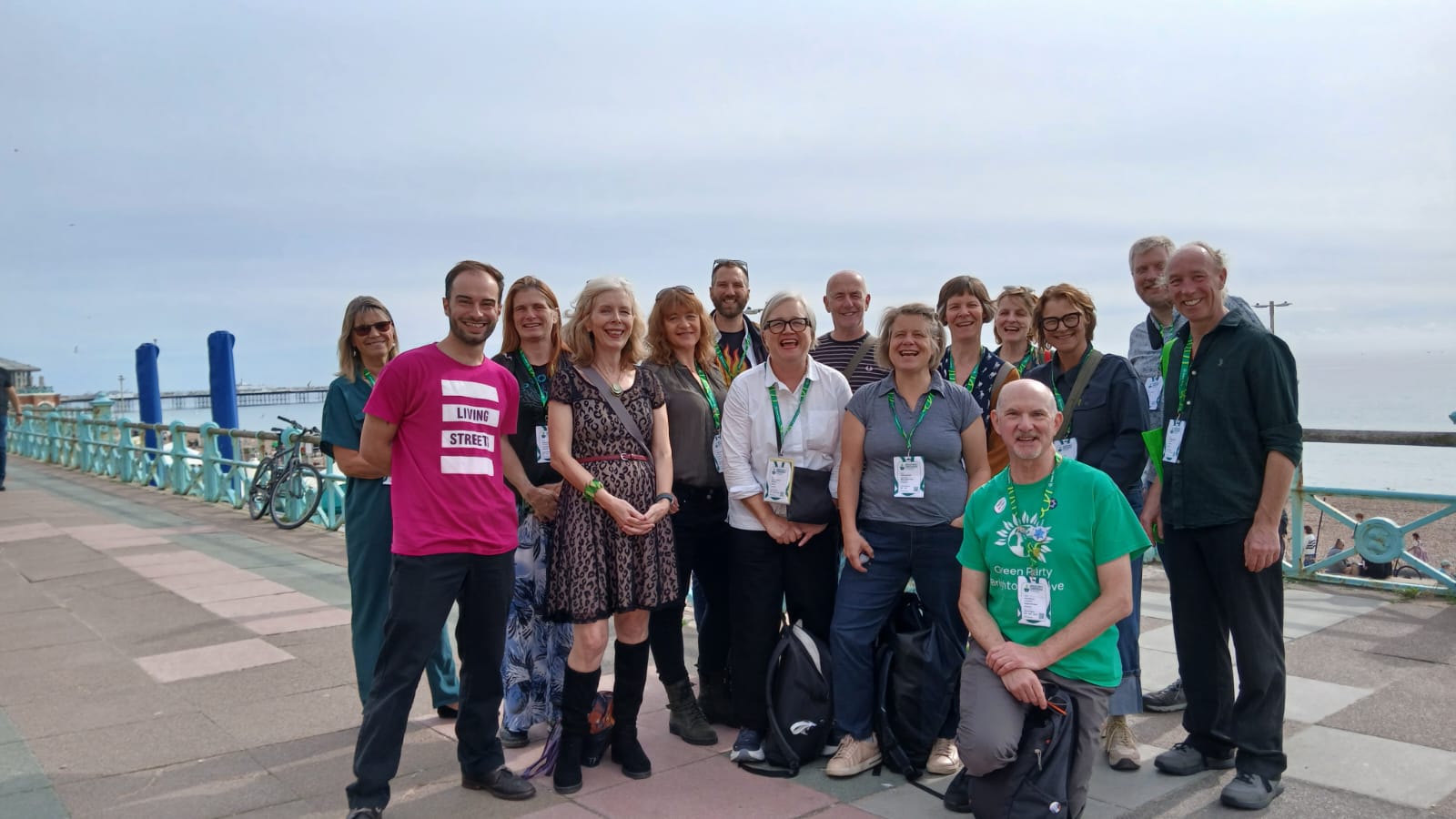 A picture from Living Streets event at Green Party Conference 2026. Activists pose for the camera on Brighton seafront