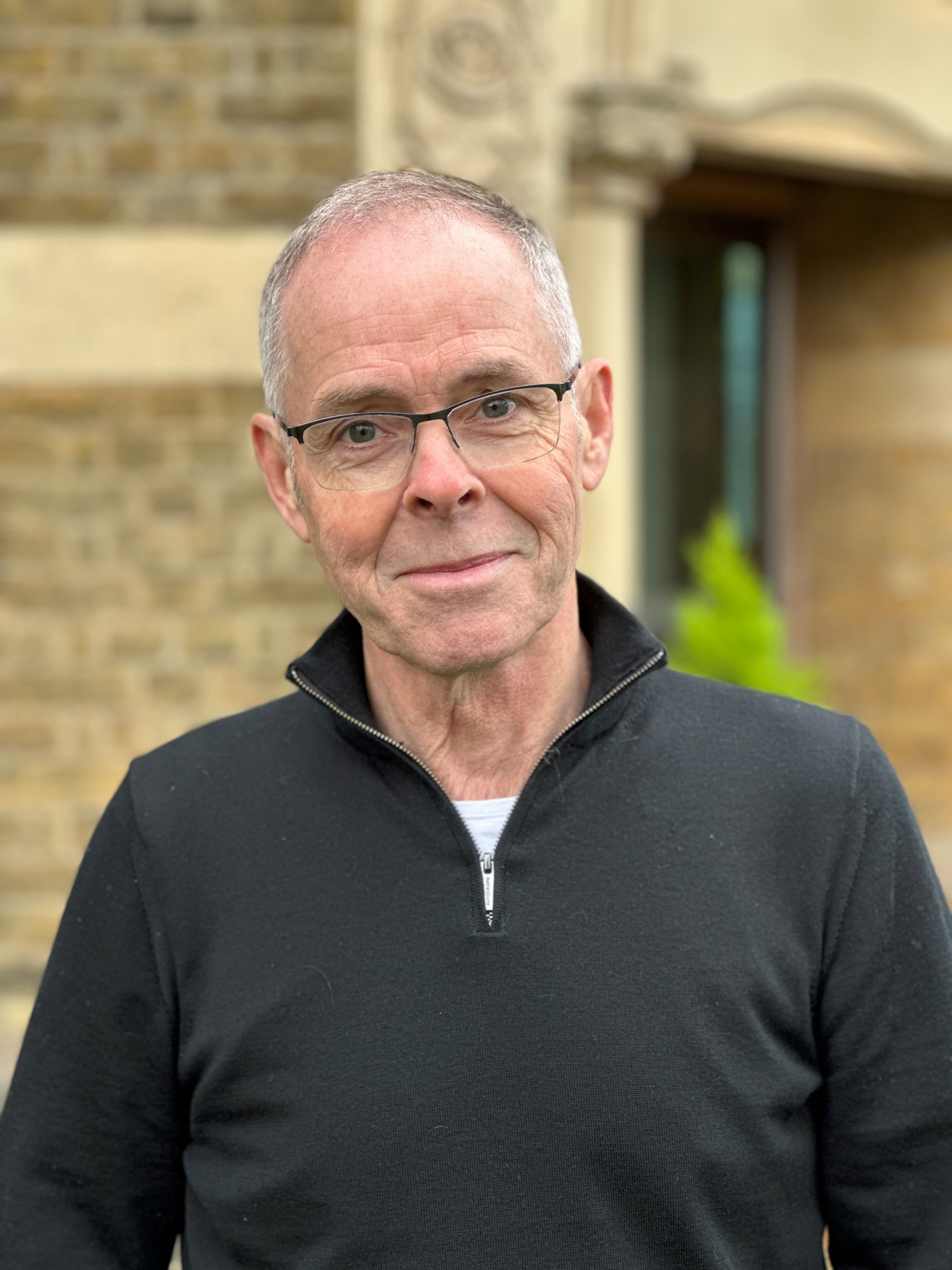 A headshot of John Dales