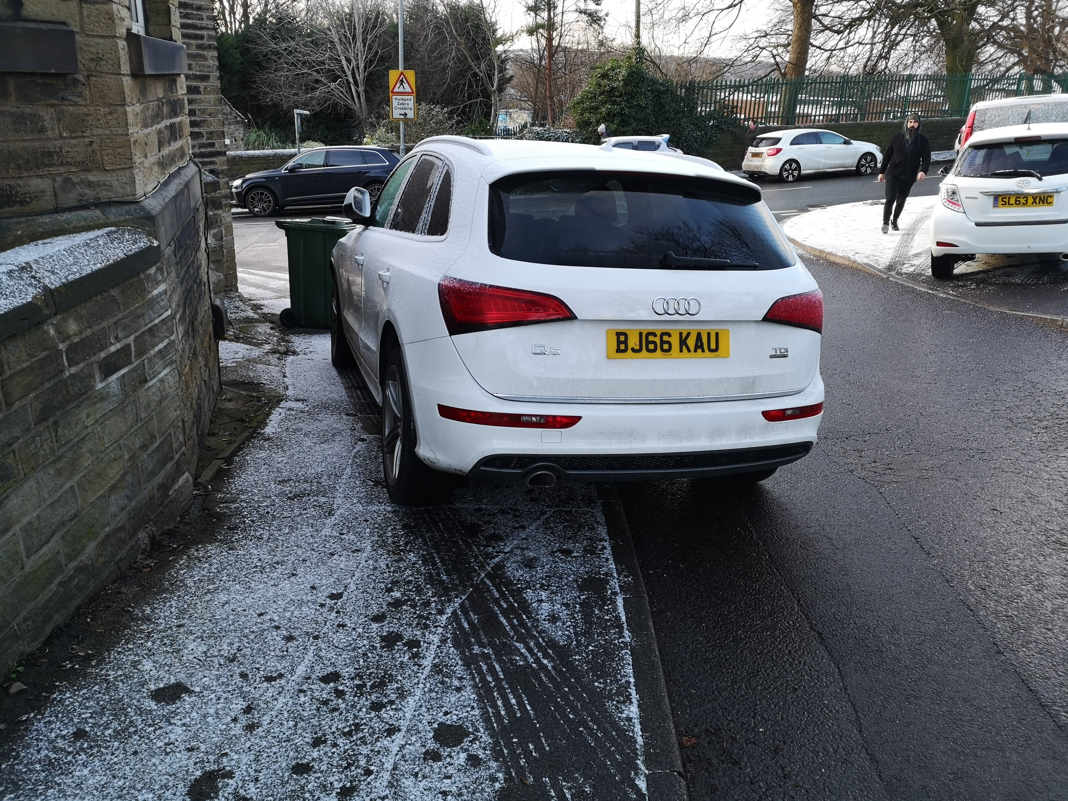 Car parked on pavement